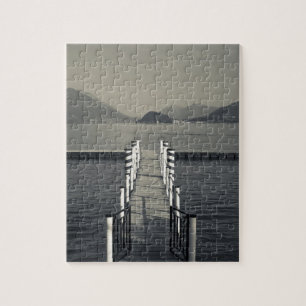 Italië, provincie Como, Tremezzo. Meer pier. Legpuzzel