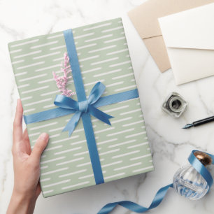 Ivoren lijnen op pastelgroen cadeaupapier