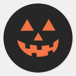 Jack-o-lantaarn Halloween pompoen gezicht truc of Ronde Sticker