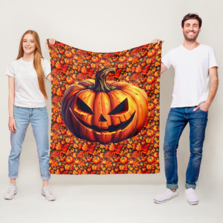 Jack-O-Lantern op herfstbladeren en pompoenen Fleece Deken