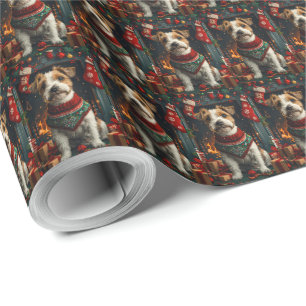 Jack Russell-hond met kerstcadeaus bij de open haa Cadeaupapier