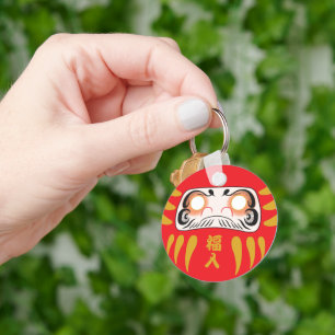 Japans daruma (geen ogen) sleutelhanger