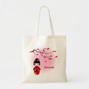 Japanse kokeshipop bij sakurabloesems tote bag