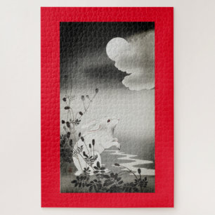 Japanse printkonijn beschouwt de moonpuzzel als ee legpuzzel