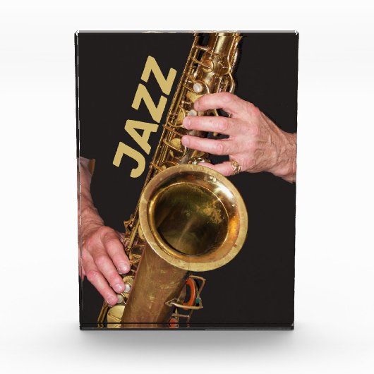 Jazzman die Gold Saxophone speelt Fotoblokken (Voorkant)