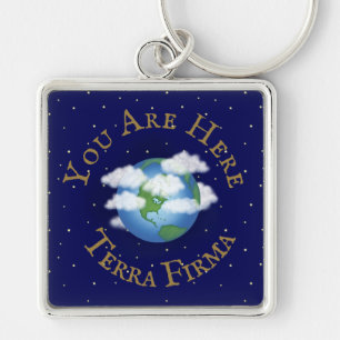 "Je bent hier - Terra Firma" Humoureuze Planet Ear Sleutelhanger