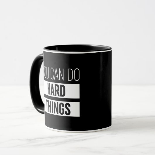 Je kunt harde dingen doen mok (Voorkant links)