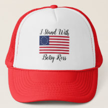 Je me tiens avec le casquette de Betsy Ross