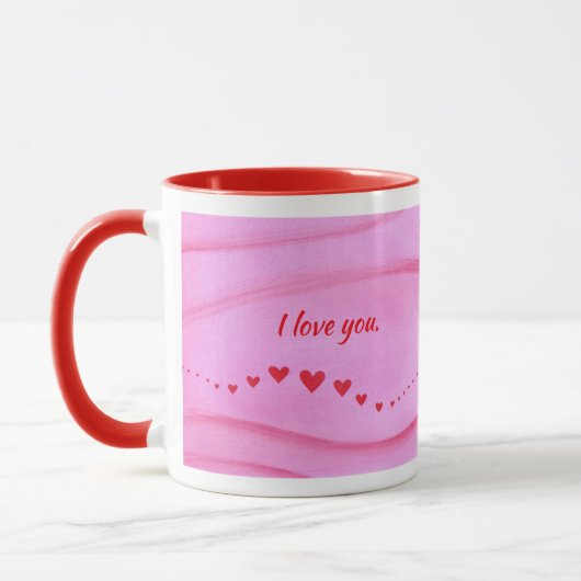 Je t'aime, vague de cœurs rouges sur des mugs pers (Gauche)