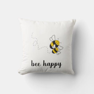 Jetez un oreiller heureux pour vous faire sourire