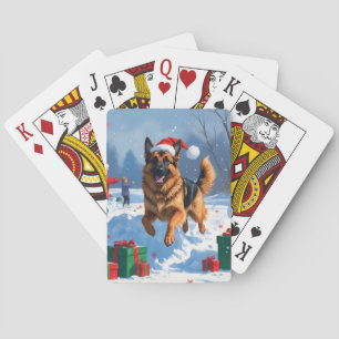 Jeu De Cartes Berger Allemand courant dans la neige avec un chap