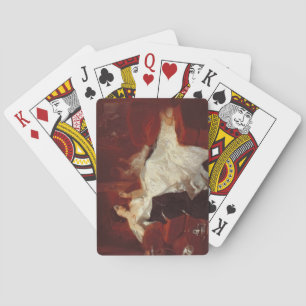 Jeu De Cartes Femme sur un canapé rouge