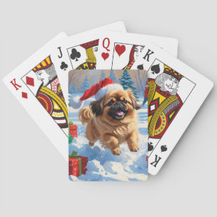 Jeu De Cartes Pékinois courant dans la neige avec un chapeau de 