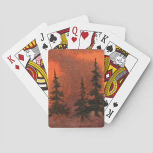 Jeu De Cartes Pins couchés de soleil dans le brouillard orange e
