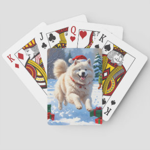 Jeu De Cartes Samoyède courant dans la neige avec un chapeau de 