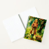 Jeune fille dans un Apple Orchard Journal (Intérieur)