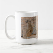 Jeune tasse de Meerkat (Gauche)