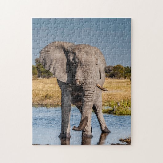 Jigzaag puzzel van olifant in het wild. (Verticaal)