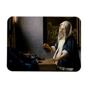 Johannes Vermeer - Woman Holding a Balance Magneet