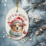 Joie du chien de Corgi mignonne au monde<br><div class="desc">Sur le devant de cet ornement de vacances est une image mignonne d'un chien Corgi habillé d'un casquette du Père Noël avec des ornements suspendus. Derrière l'image se trouve un arrière - plan à confettis doré. Le texte rouge dit "Joy to the World". Le dos de l'ornement a le même...</div>