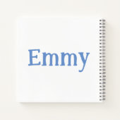 Joli ange de dessin animé avec un cahier bleu (Dos)