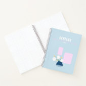 Joli cahier bleu bébé avec des fleurs géométriques (Intérieur)