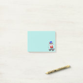 Joli chat skater sur des Post-it Notes bleu sarcel (Sur un bureau)