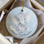 Joli Elephant Boys Premier Ornement de Noël<br><div class="desc">Adorable éléphant en nuances de gris posé sur un arrière - plan bleu clair pour le 1er Noël du bébé.</div>