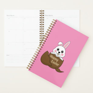 Joli lapin blanc dans un oeuf au chocolat Joyeux P