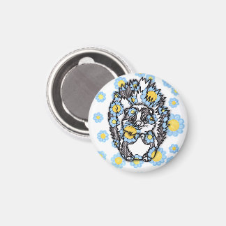Joli magnet rond représentant un moufette avec des