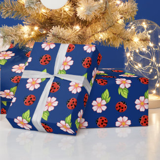 Joli papier cadeau à motif coccinelle et marguerit