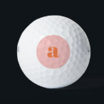 Joli Pastel rose orange Monogramme rétro Lettres<br><div class="desc">Ces boules de golf élégantes présentent votre monogramme en corail sur un arrière - plan rose pastel en lettrage rétro. Super idée cadeau !</div>