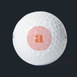 Joli Pastel rose orange Monogramme rétro Lettres<br><div class="desc">Ces boules de golf élégantes présentent votre monogramme en corail sur un arrière - plan rose pastel en lettrage rétro. Super idée cadeau !</div>