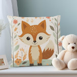 Joli renard de bois, Coussin de crèche neutre par<br><div class="desc">PixeliaDesigns présente le "Cute Woodland Fox" Nursery Coussin, un ajout délicieux à toute pépinière neutre pour les femmes. Ce charmant coussin présente des illustrations chaleureuses d'animaux de la forêt, dont un renard, un ours, un cerf et un écureuil, le tout dans des tons sereins et doux qui créent une atmosphère...</div>