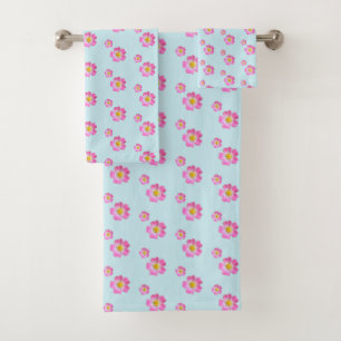 Jolies fleurs roses sur fond bleu clair