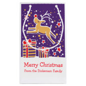 Jolis rennes dansant au-dessus du sac de cadeaux d (Dos)