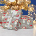 Jolly Santa Claus Vintage Christmas<br><div class="desc">Ce papier d'emballage cadeau de Noël présente un graphique classique du Père Noël sur un arrière - plan gris taupe. Le design est accentué avec des arcs rouges et des flocons de neige et le texte blanc "Joyeux Noël".</div>