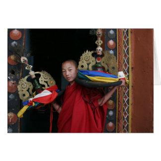 Jonge monk met zwarte Petten