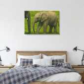 Jonge olifant met voogd in grasreservaat canvas afdruk (Insitu (Slaapkamer))