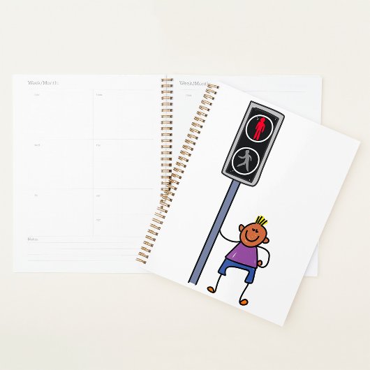 Jongen bij voetgangersoversteekplaats met rood sto planner