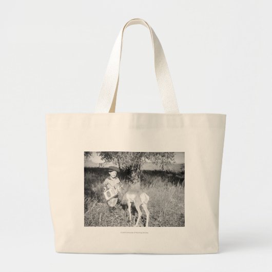 Jongen die met de hand antilopen grote tote bag (Voorkant)