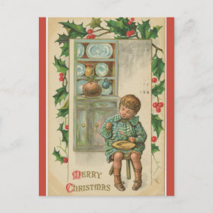  jongen die plum Pudding Kerstmis eet Briefkaart