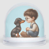 Jongen en teckel puppy sneeuwbol (Voorkant)