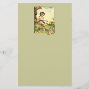 Jongen lezen onder boom met konijnen briefpapier