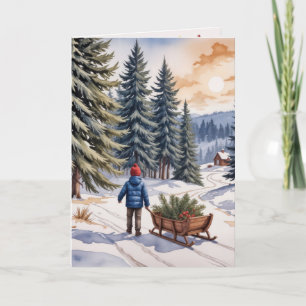 Jongen trekt slee met kerstgroen takken kaart