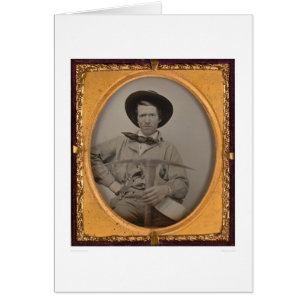 Joseph Sharp, met een pluizenbijl, pan en pistool 