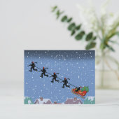 Joueurs de hockey tirant la carte de voeux pliée d (Debout devant)