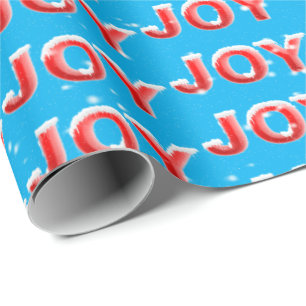 JOY-tekst met sneeuwvlokken op de achtergrond van Cadeaupapier