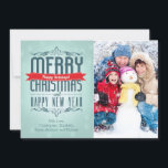 Joyeux Noël typographie Carte photo de vacances<br><div class="desc">Joyeux Noël,  fêtes heureuses et bonne nouvelle année vintage typographie mise sur un arrière - plan bleu sombre avec des flocons de neige</div>