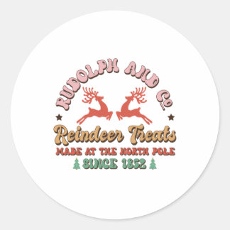 Juiste rendierbehandelingen met kerstcadeau ronde sticker